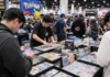 Backyard Breeders Offer French Bulldog Puppies for Pokémon Cards at Conventions Pokémon trading cards at a TCG convention